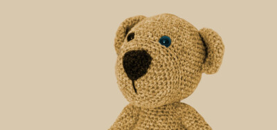 głowa pluszowego misia